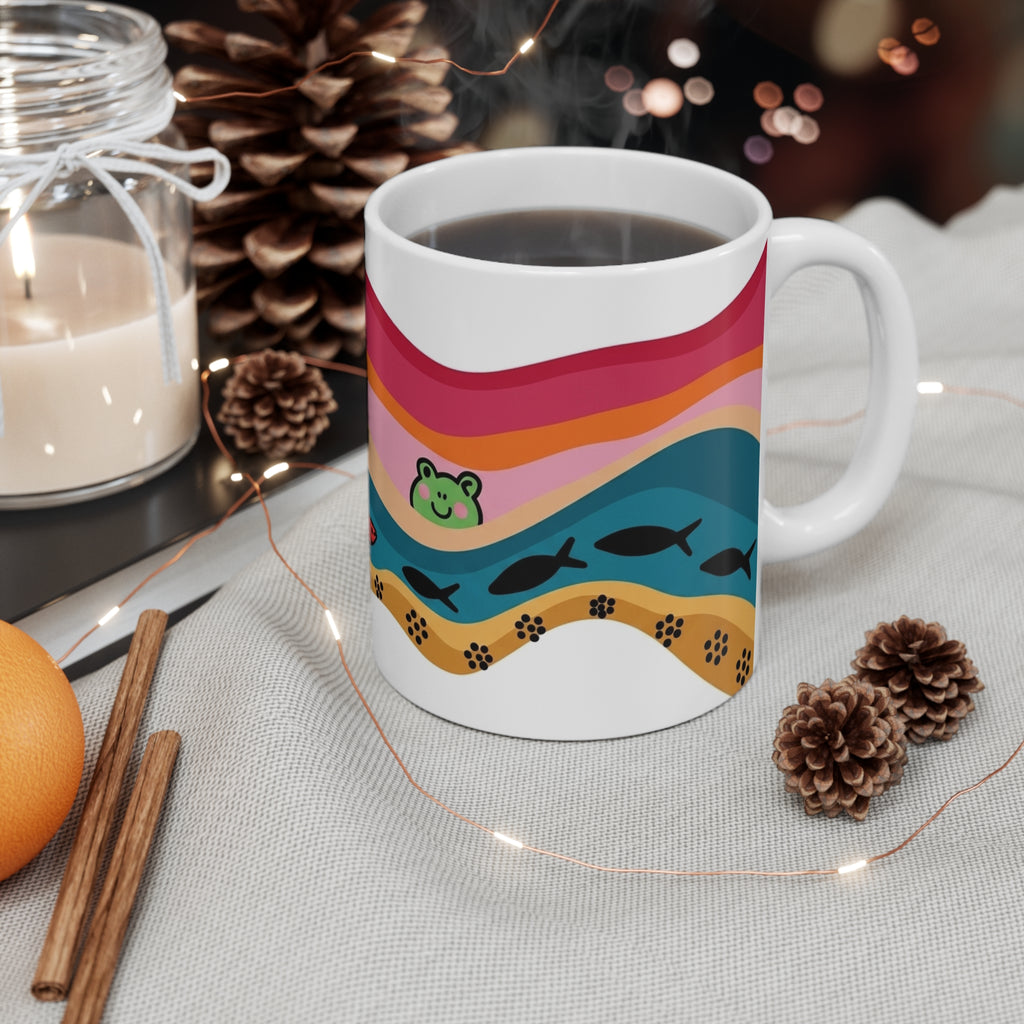 Playful Frog Pond Mug | Colorful Waves, Fish and Paw Print Border